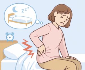 朝起きたときに腰の痛みを感じている女性のイラスト